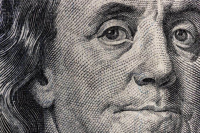 3 Real Estate Myths That Can Turn Potential Profits Into Huge Loss Closeup of Ben Franklin on a one hundred dollar bill