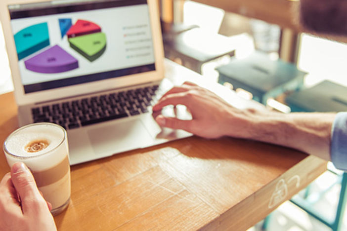 Want to Find and Close More Deals? Get Better Data! real estate investor looking at data on computer