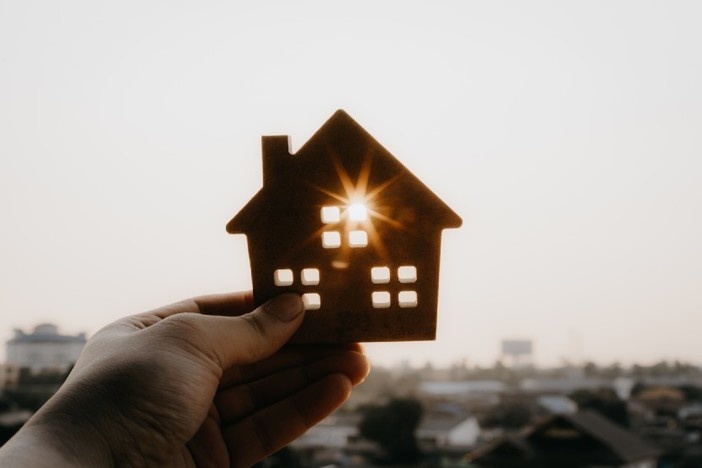 How to Invest in Real Estate With Only $1,000 paying-off-mortgage