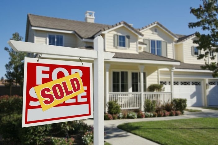 7 Ways to Get Your Offer Accepted in a Hot Market A newly constructed, modern american home.