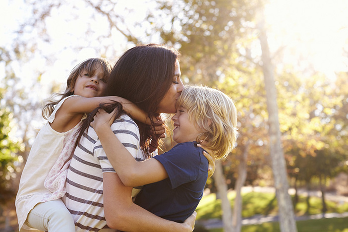 Balancing Your Business ‘Why’ With Your Personal ‘Now’ Mother Carrying Son And Daughter As They Play In Park