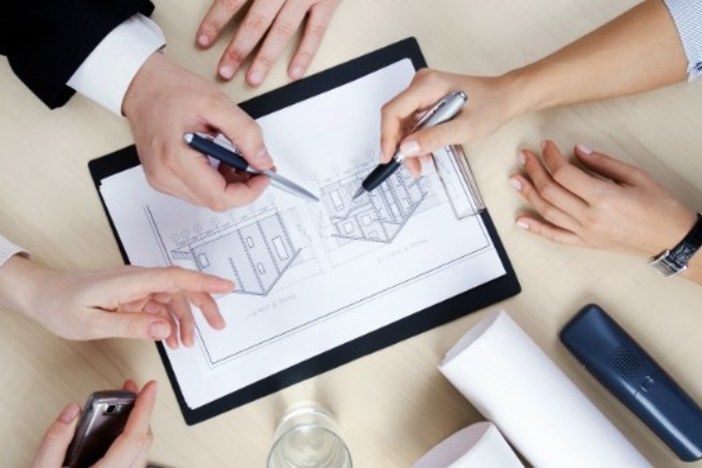 4 Key Traits That Define a Good Employee or Business Partner real_estate_business_team